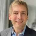 Travis May